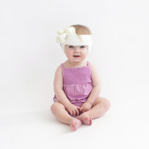 Smocked Bubble Romper in Poi